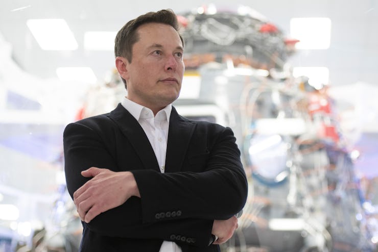 SpaceX Chief Engineer Elon Musk speaks in front of Crew Dragon cleanroom at SpaceX Headquarters in H...