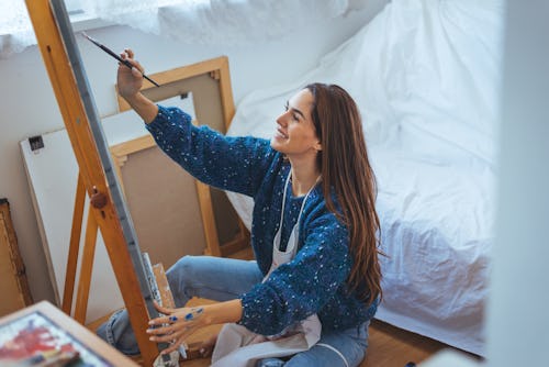 A woman paints. Here’s your daily horoscope for february 24, 2022.
