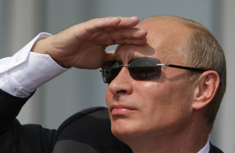 Russian Prime Minister Vladimir Putin watches flights during an opening ceremony oft he MAKS 2009 in...