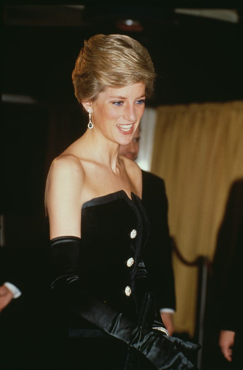 Princess Diana wearing a black dress.