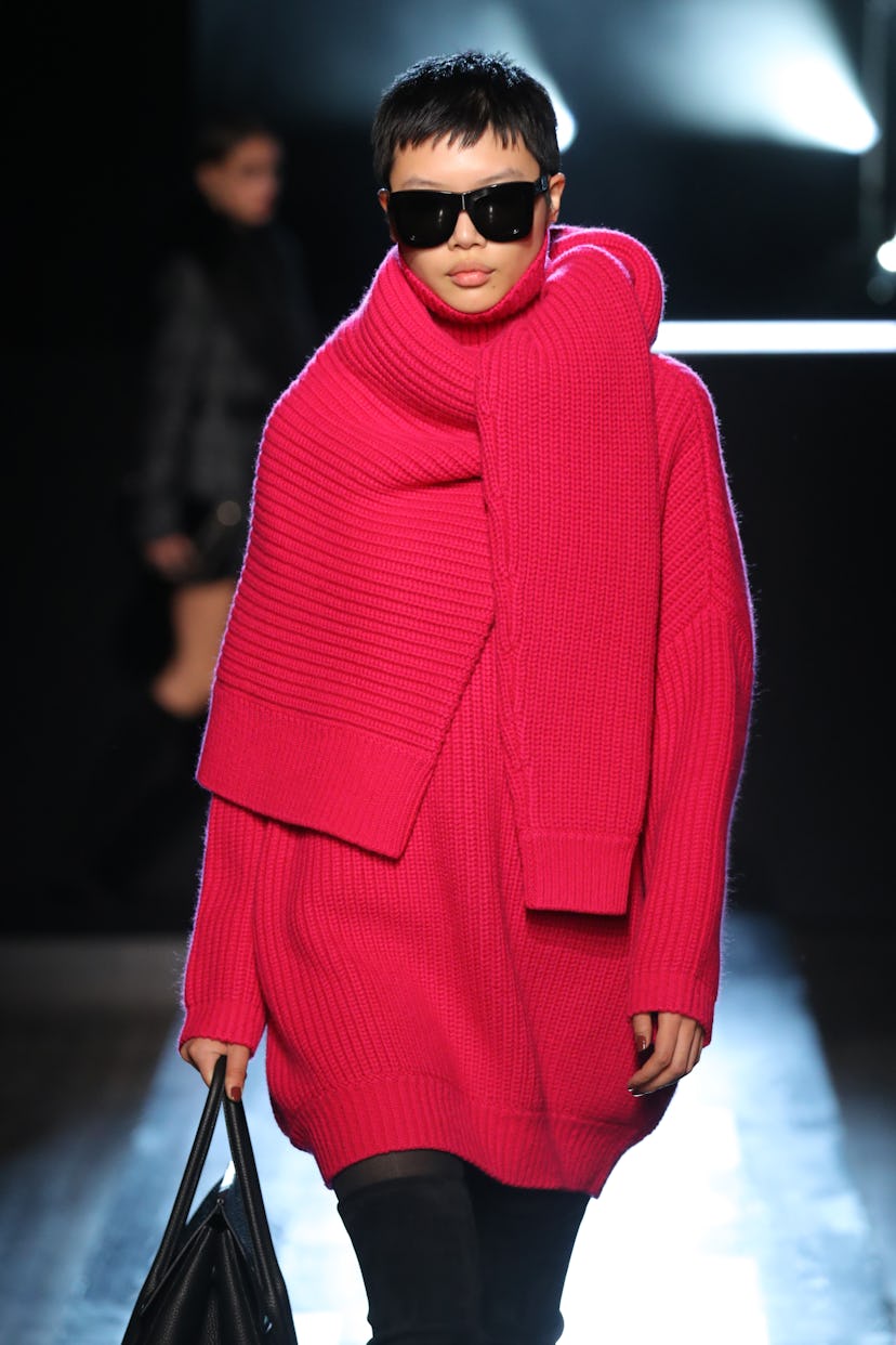 A model walks the Michael Kors runway at New York Fashion Week.