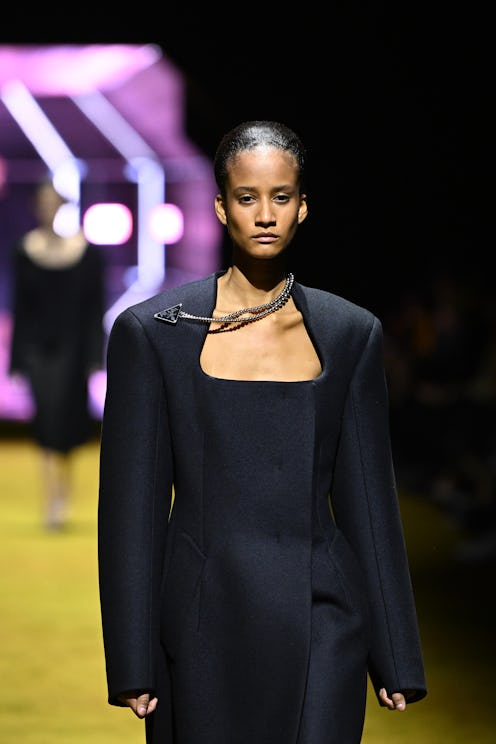 MILAN, ITALY - FEBRUARY 24: A model walks the runway at the Prada fashion show during the Milan Fash...
