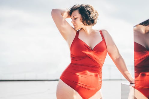 Beautiful curvy woman in swimwear.