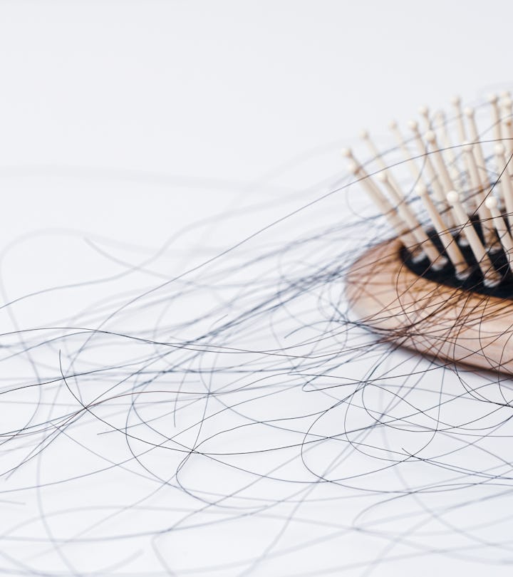 hairbrush with hair in it