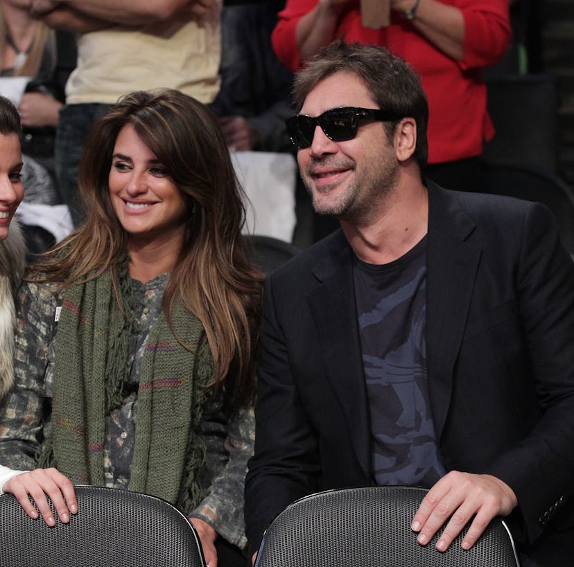 LOS ANGELES, CA - DECEMBER 25:  Penélope Cruz and Javier Bardem attend a game between the Miami Heat...