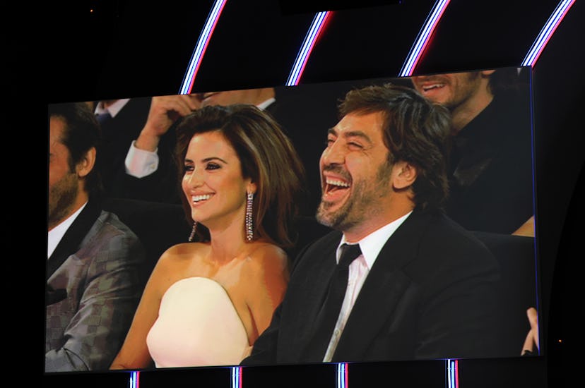 (FILES) Spanish actress Penélope  Cruz (L) and Spanish actor Javier Bardem are seen on a screen duri...