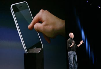 Steve Jobs, Apple Inc. CEO, shows the new iphone