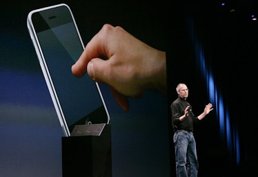 Steve Jobs, Apple Inc. CEO, shows the new iphone