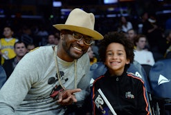LOS ANGELES, CA - JANUARY 19: Actor Taye Diggs and his son  Walker Diggs attend a basketball game be...