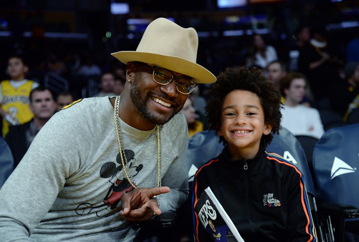 LOS ANGELES, CA - JANUARY 19: Actor Taye Diggs and his son  Walker Diggs attend a basketball game be...