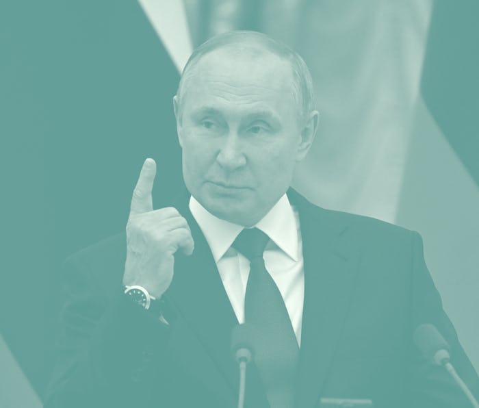 Russian President Vladimir Putin speaks during a joint press conference with German Chancellor follo...