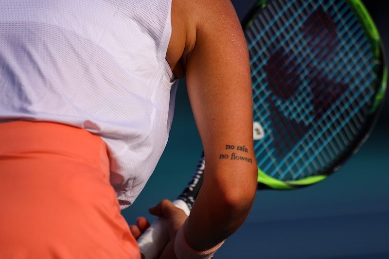 Tennis player Markéta Vondroušová's tattoo font is classic.