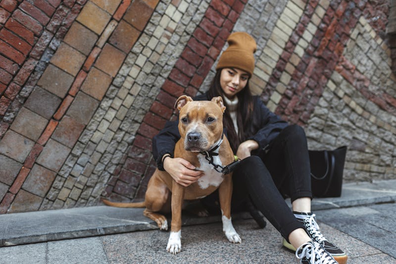 woman hanging out with her dog