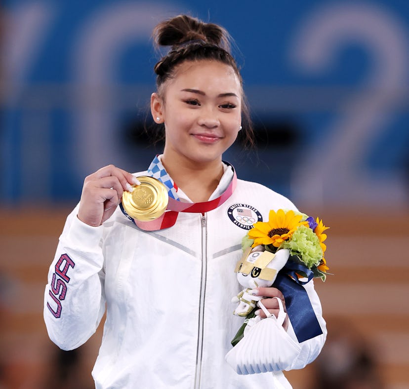 Watch Suni Lee perform the nabieva during her uneven bars performance that made NCAA history.