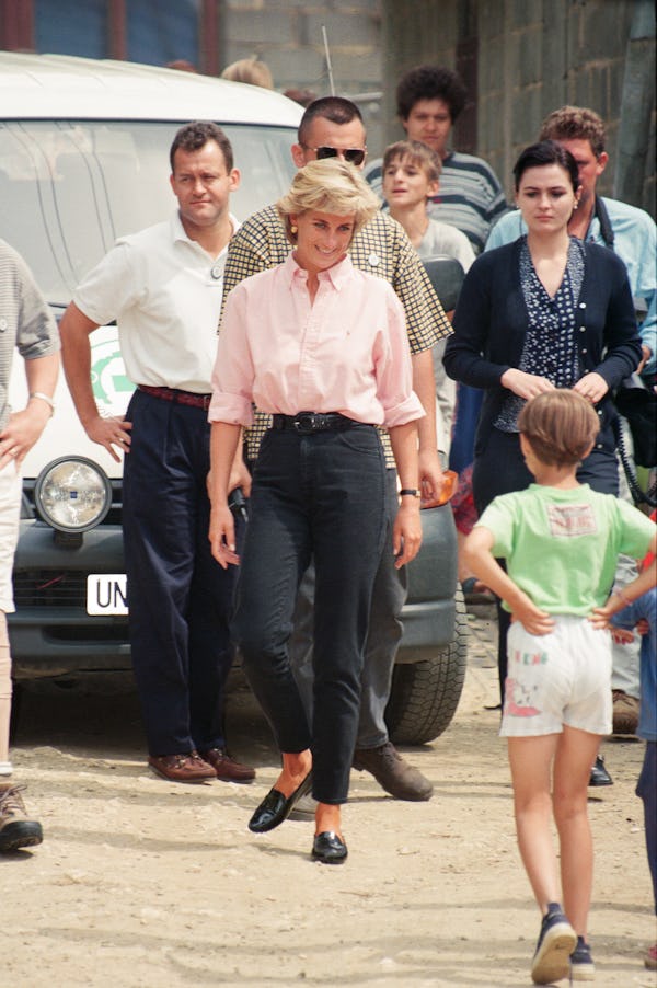 Paul Burrell (left, in the background in the white shirt and black trousers, butler to Diana, Prince...