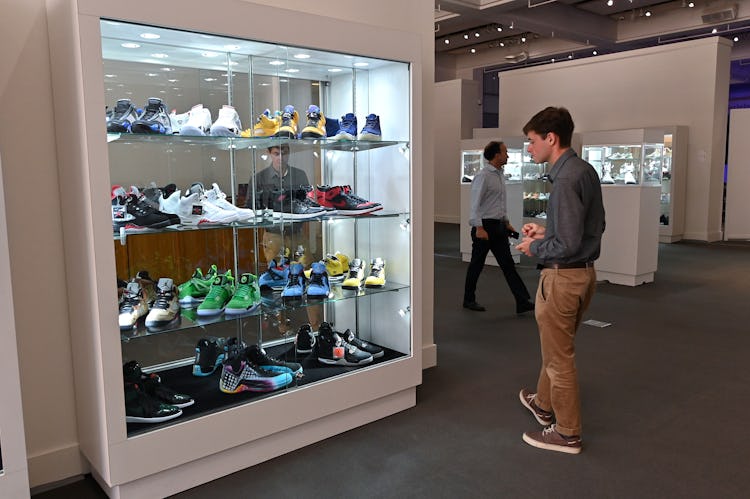 NEW YORK, NEW YORK - JULY 15: Guests view sneakers on display for "The Ultimate Sneaker Collection" ...