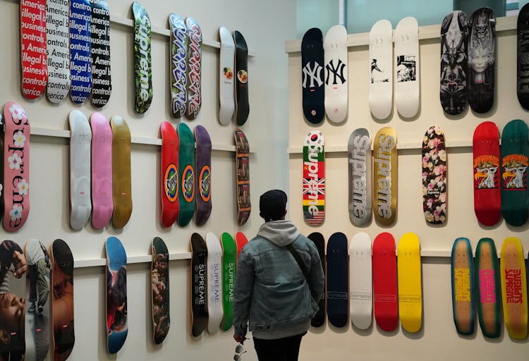 People admire the Sothebys New York display of the only privately owned collection of every Supreme ...