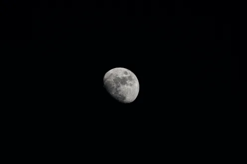 Low Angle View Of Moon Against Clear Sky At Night,Lunar Eclipse