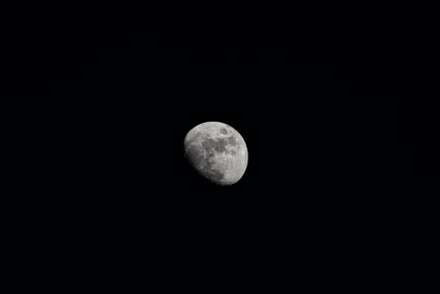 Low Angle View Of Moon Against Clear Sky At Night,Lunar Eclipse