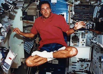 Photo taken 03 November 1994 of Jean-François Clervoy, ESA astronaut floating in space in the shuttl...