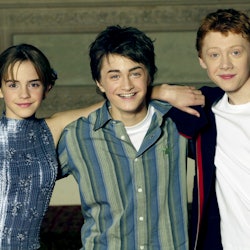 LONDON - OCTOBER 25, 2002: Actors Emma Watson, Daniel Radcliffe and Rupert Grint attend a photocall ...