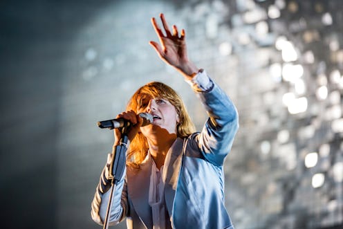 Florence Welch performs with her band Florence + The Machine