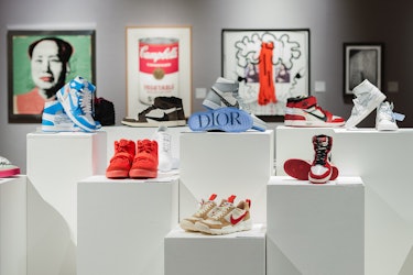 Nike footwear collection including a pair of Nike Sky Jordan 1, 1985, featuring Chicago Bulls white, black...