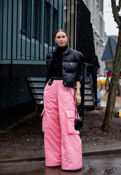 COPENHAGEN, DENMARK - FEBRUARY 01: Pernille Teisbaek seen wearing wide leg pink pants, Prada vest, P...