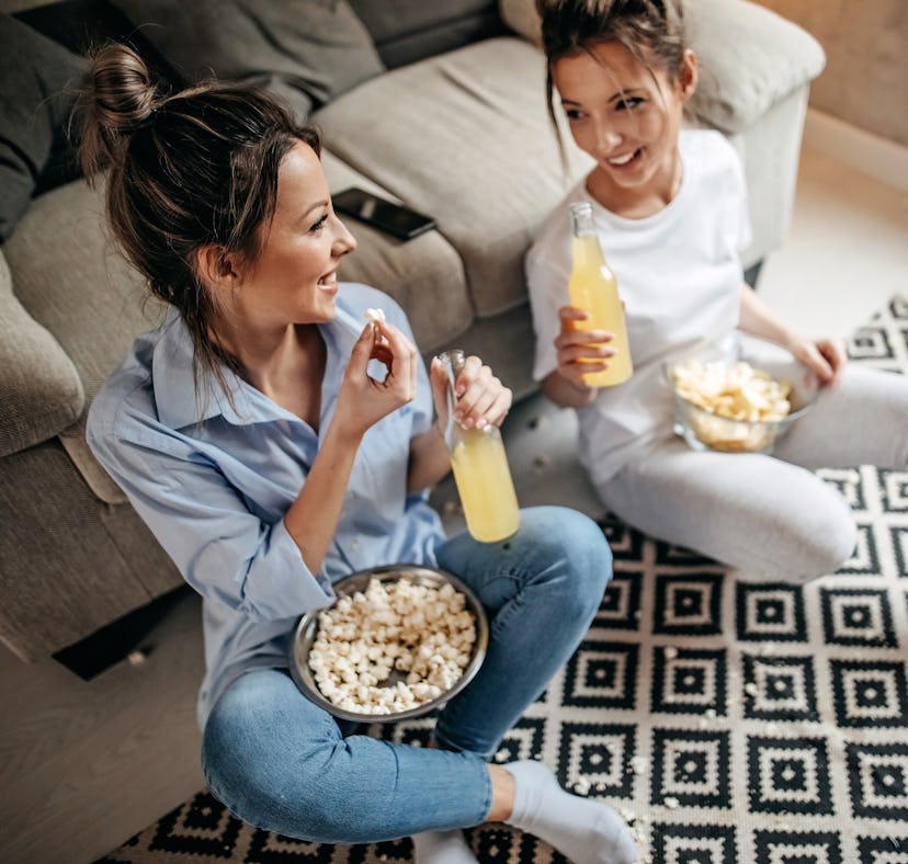 Friends are enjoying Super Bowl drink recipes from TikTok, while watching the football game.