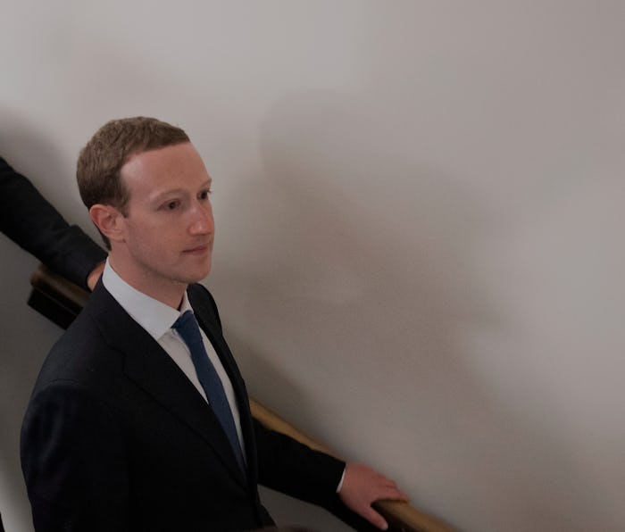 Mark Zuckerberg departs a meeting on Capitol Hill in Washington, DC, on April 9, 2018. - Embattled F...