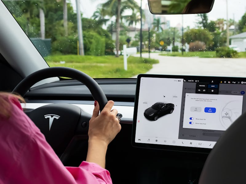 Miami, FL, United States - September 13, 2021: A cockpit with LCD touch screen of electric car Tesla...