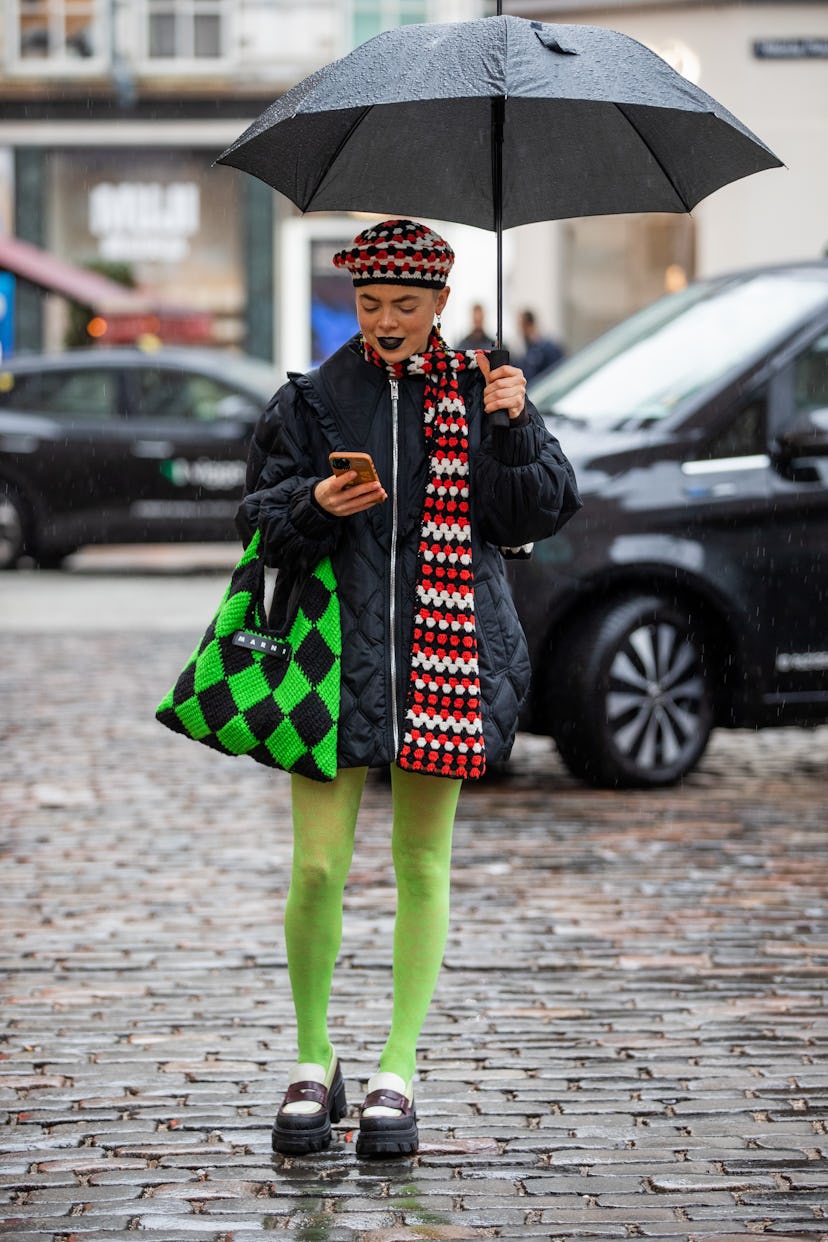 COPENHAGEN, DENMARK - FEBRUARY 03: Emma Fridsell seen wearing green black Marni bag, black puffer ja...