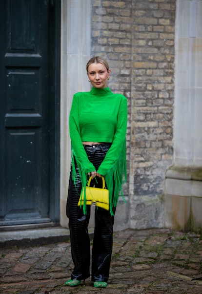COPENHAGEN, DENMARK - FEBRUARY 02: Justyna Czerniak wearing green top with finges seen outside Stine...