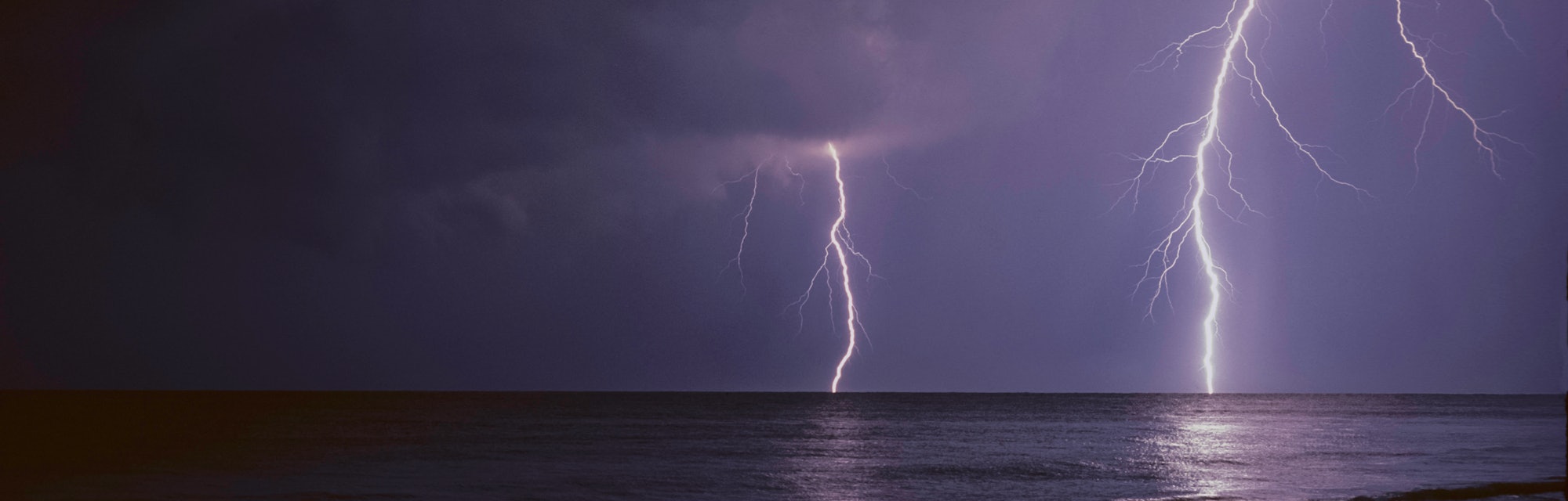 Gulf of Mexico lightning storm off shore from the beach.