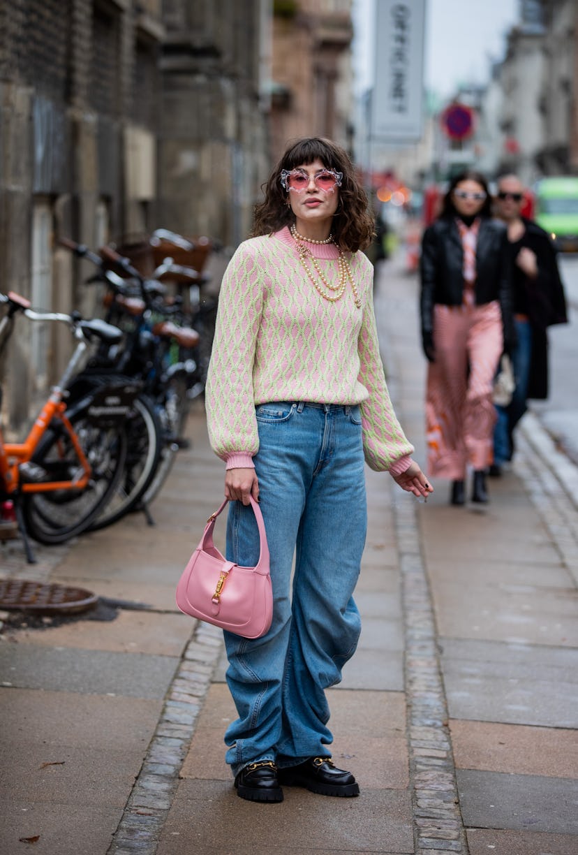 COPENHAGEN, DENMARK - FEBRUARY 02: Lea Naumann is seen wearing sunglasses, Chanel necklace, denim je...