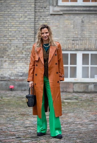 COPENHAGEN, DENMARK - FEBRUARY 02: Mija Knezevic seen wearing brown trench coat, green pants, cordur...