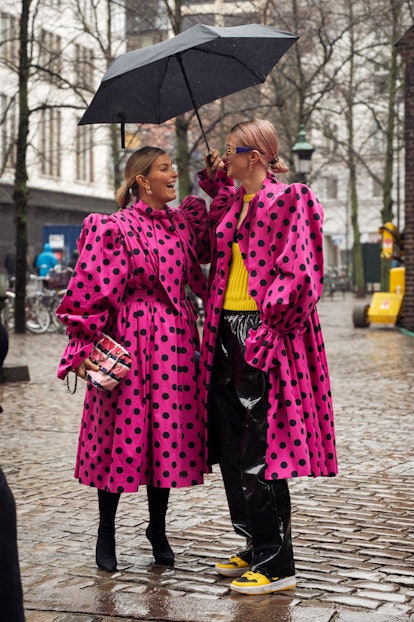 COPENHAGEN, DENMARK - FEBRUARY 03: Janka Polliani and Marianne wearing matching pink dresses togethe...