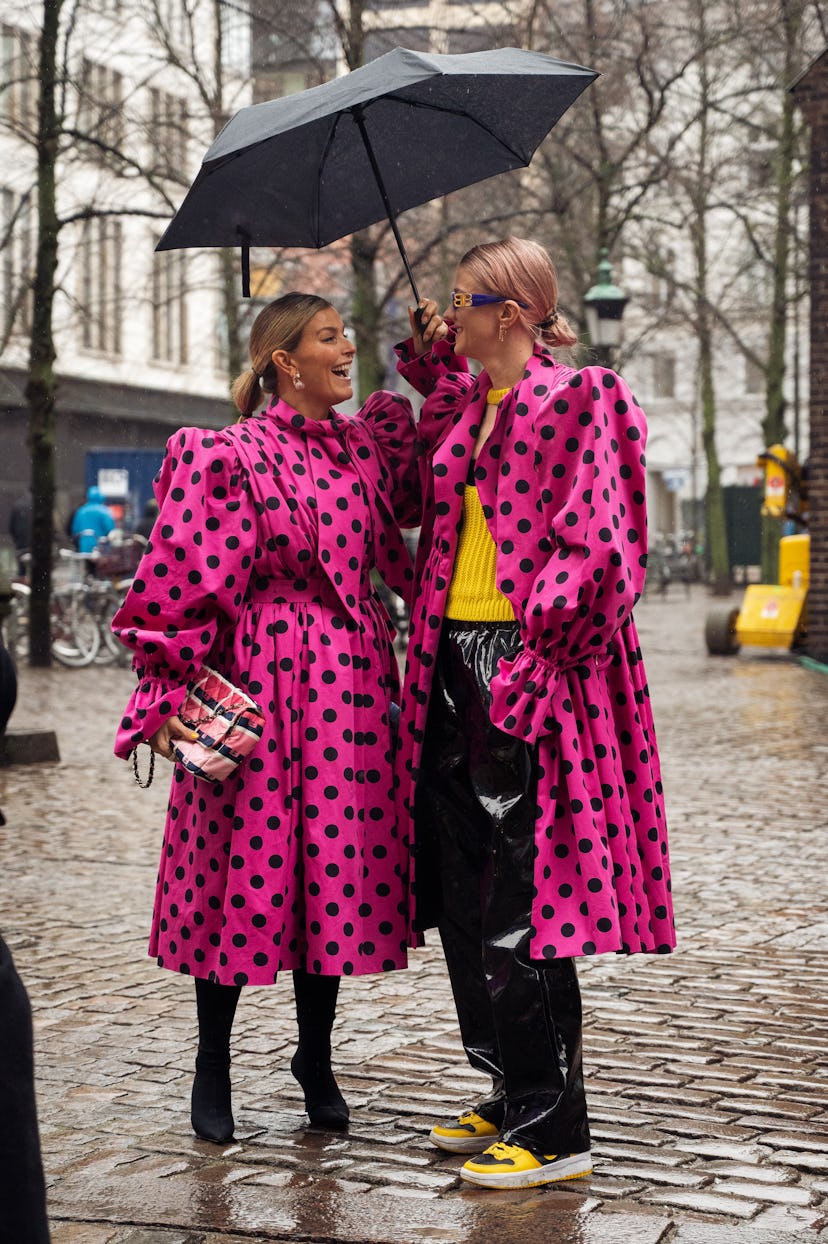 COPENHAGEN, DENMARK - FEBRUARY 03: Janka Polliani and Marianne wearing matching pink dresses togethe...