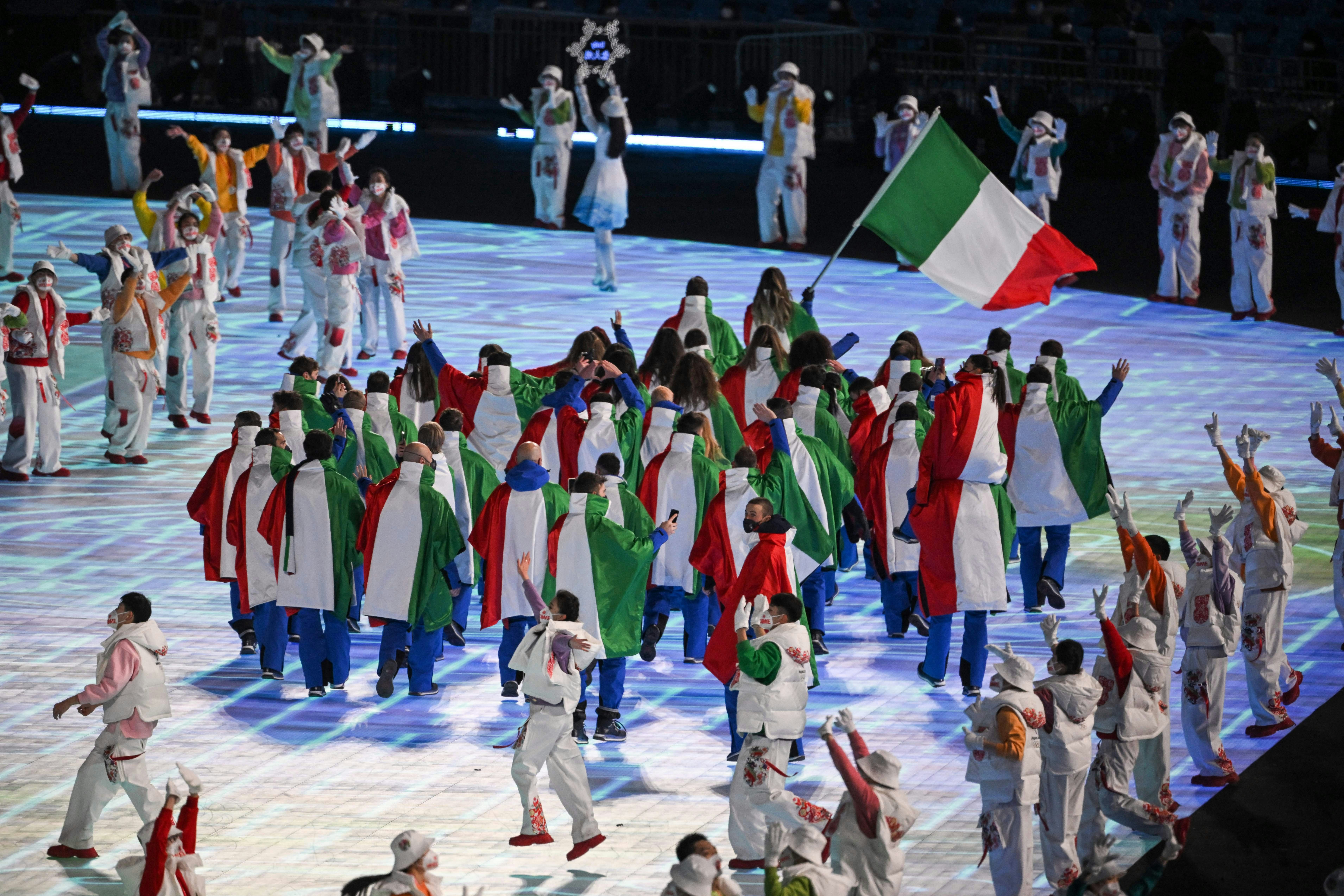 Italian delegates at the 2022 Winter Olympics opening ceremony wore festive outfits.