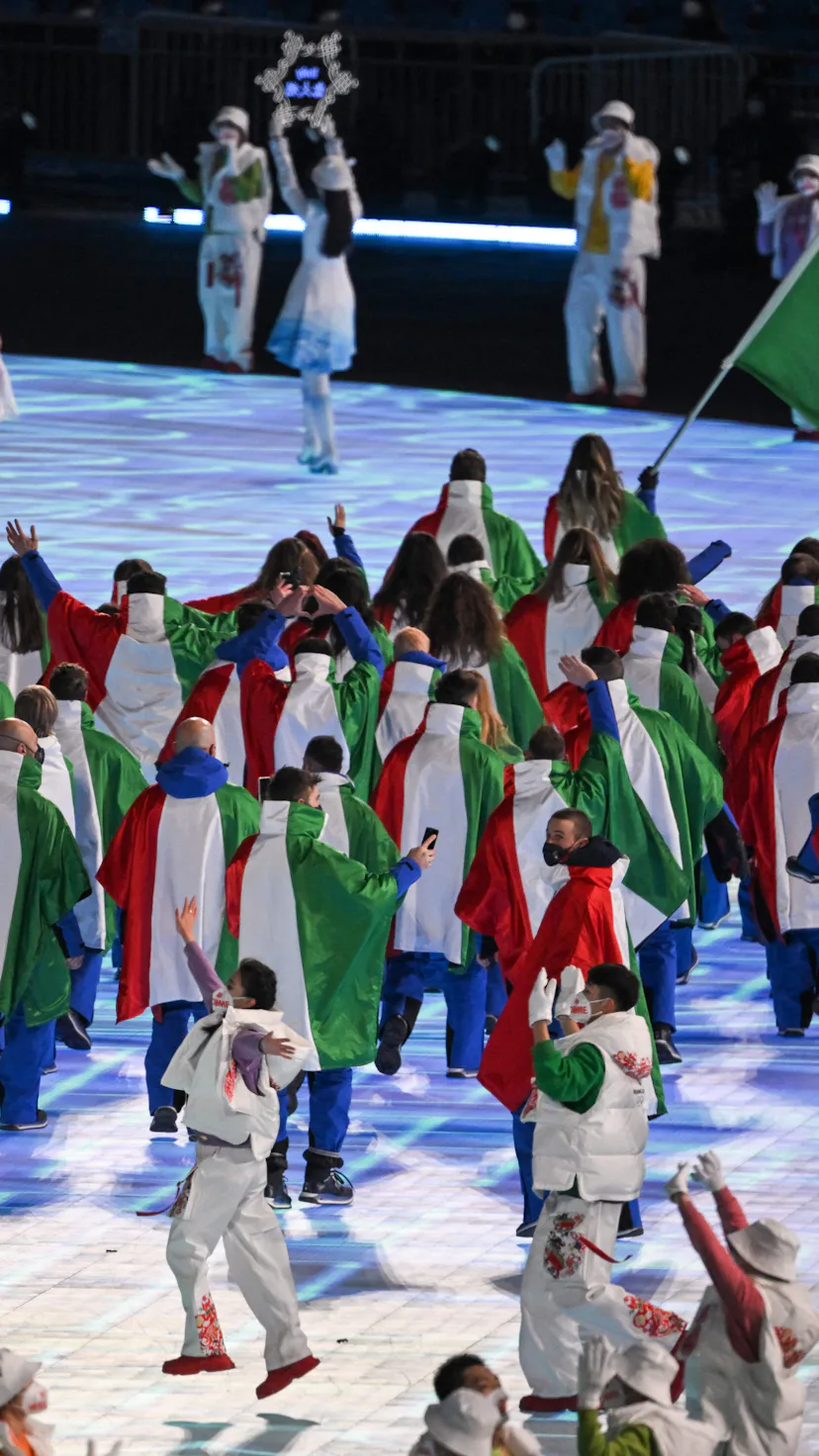 Italian delegates at the 2022 Winter Olympics opening ceremony wore festive outfits.