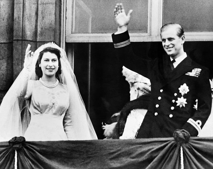 Queen Elizabeth II and Prince Philip, Duke of Edinburgh wave at their wedding, on November 20, 1947,...