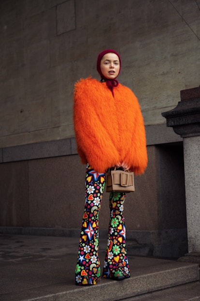 COPENHAGEN, DENMARK - FEBRUARY 03: Emma Fridsell wearing colourful suit and bright orange fur coat a...