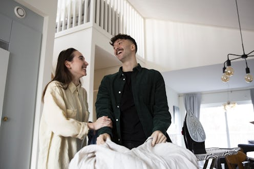 couple putting a house together