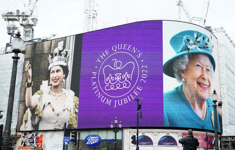 Images of Queen Elizabeth II are displayed on the lights in London's Piccadilly Circus to mark her P...