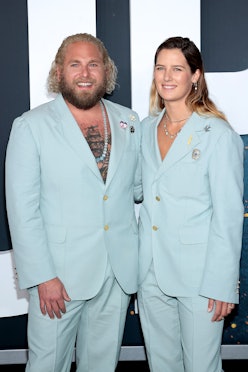 Jonah Hill and Sarah Brady wear matching blue Gucci suits.