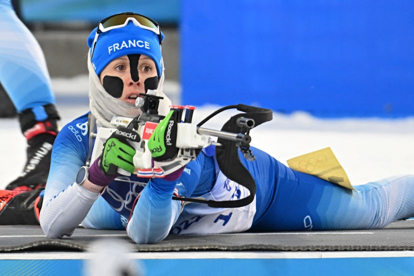 Why do Olympic skiiers wear tape on their faces?