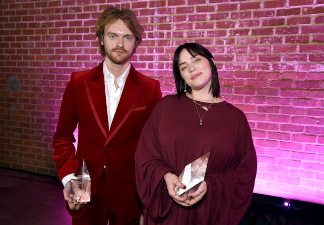 LOS ANGELES, CALIFORNIA - DECEMBER 04: (L-R) Finneas and Billie Eilish, winners of the Film Song of ...