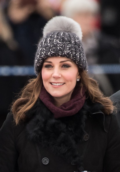 Kate Middleton in a knit, pom beanie during a visit to Stockholm in 2018
