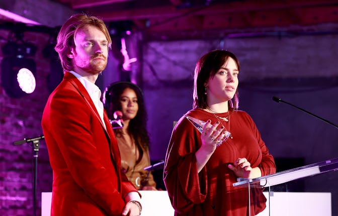 LOS ANGELES, CALIFORNIA - DECEMBER 04: (L-R) Finneas and Billie Eilish accept the Film Song of the Y...