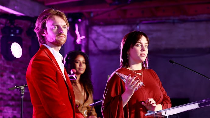 LOS ANGELES, CALIFORNIA - DECEMBER 04: (L-R) Finneas and Billie Eilish accept the Film Song of the Y...